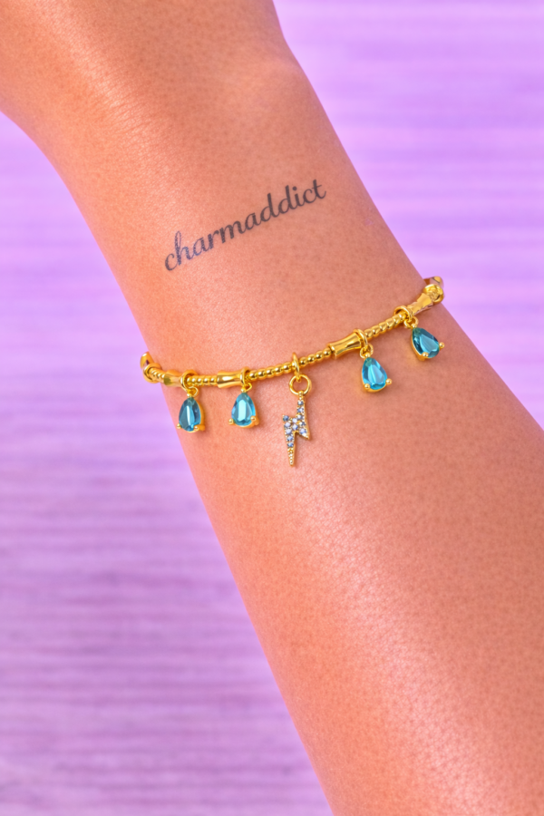 Bracelet Doré Charms Éclair & Pierres Bleues