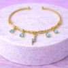 Bracelet Doré Charms Éclair & Pierres Bleues
