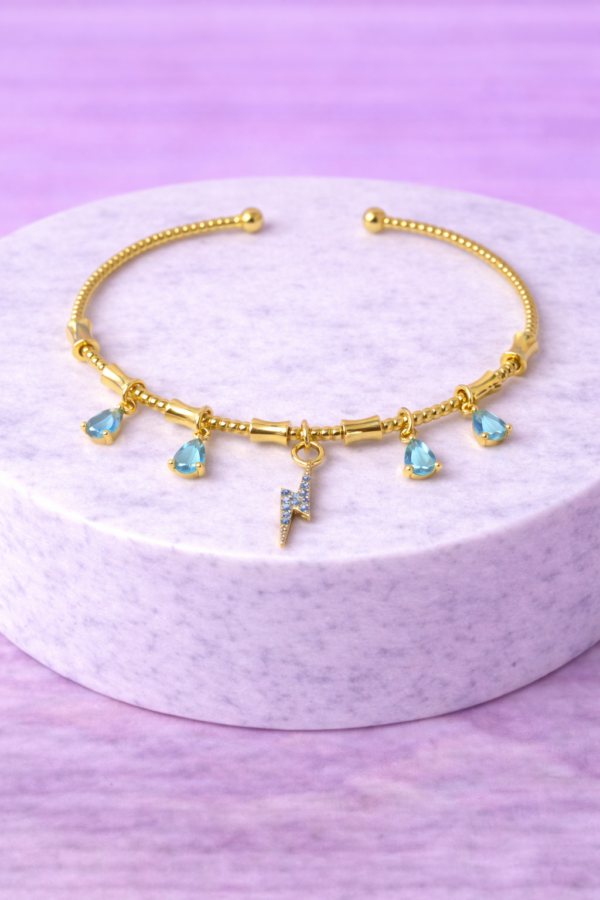 Bracelet Doré Charms Éclair & Pierres Bleues