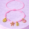 Bracelet Pré-fait Cordon Rose Charms Dorés – Enfant & Adulte