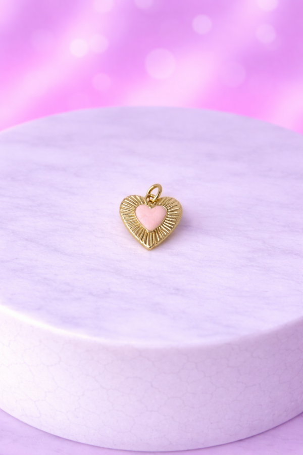 bc275741-3359-4b34-9657-fcb5d8cadefa Charms Cœur Doré Rayonnant au Cœur Rose