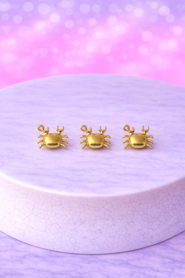 d77bcbf1-1916-415e-8044-200667422b62 Charms Crabe Doré – Inspiration Marine